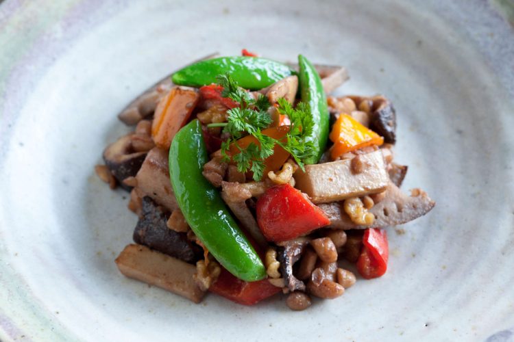 Tempeh and spring vegetables stir-fried in red wine and miso